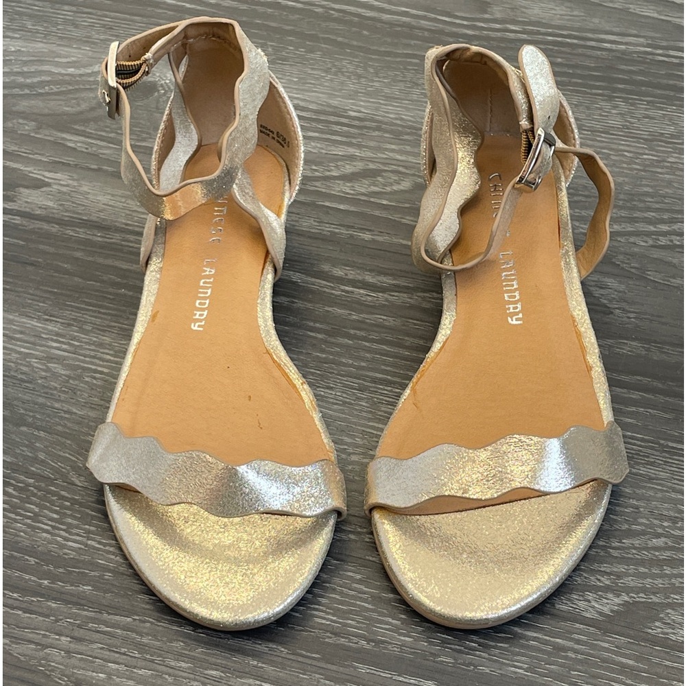 Light golden color sandals.